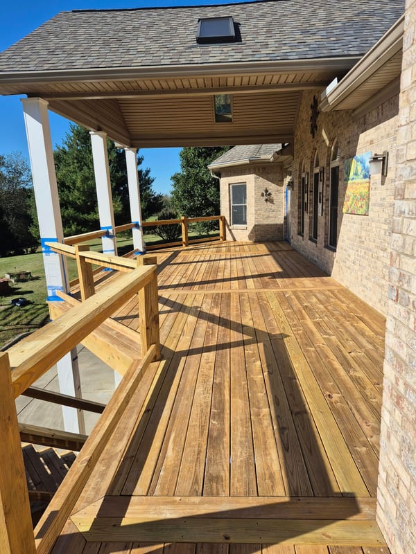 Deck attached to brick home — Deck Pros Plus