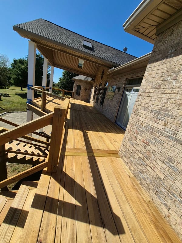Deck with railing on brick house — Southern Indiana project